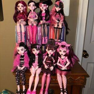 Monster High Doll Collection with Pink and Black Outfits